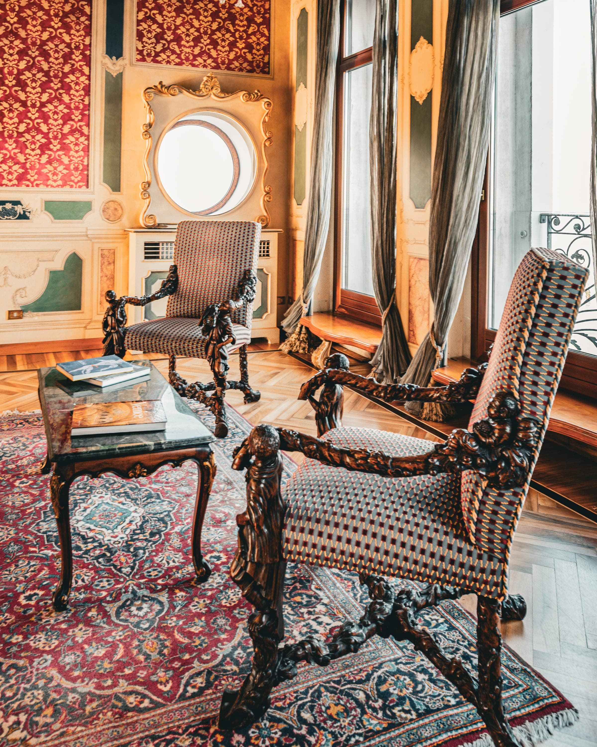 Antique armchairs in Venetian sitting room