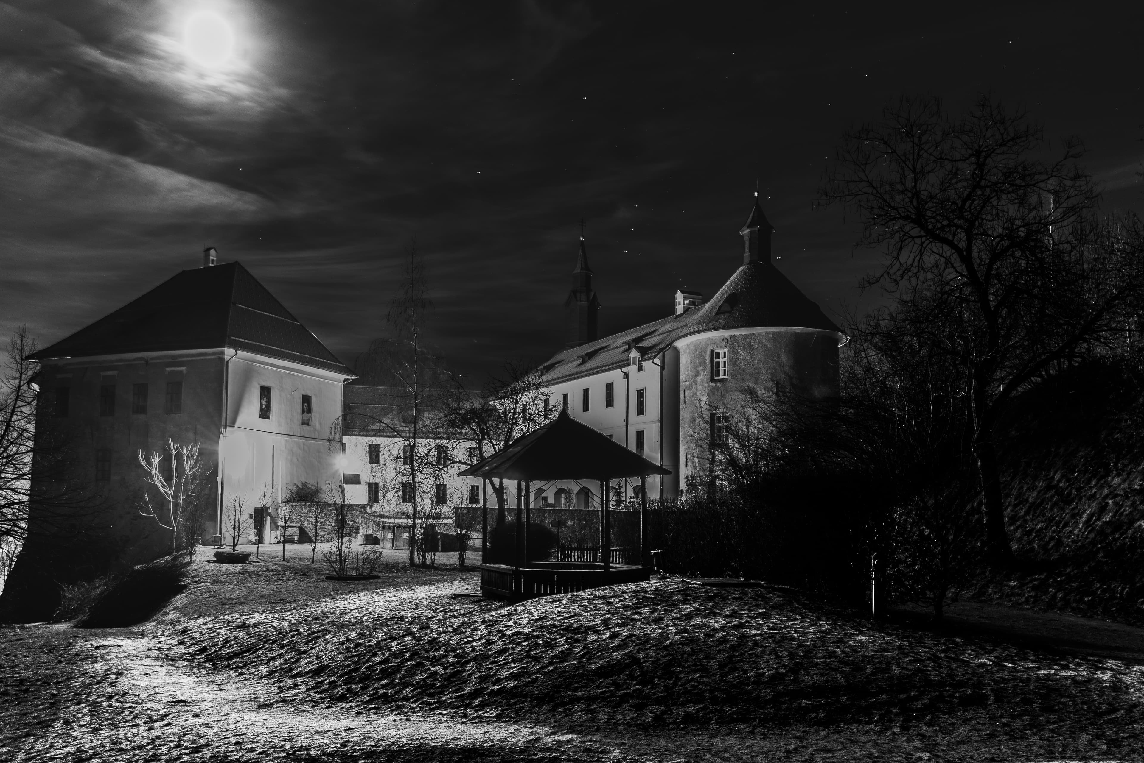 Moonlit Škofja Loka Castle Under Winter Sky
