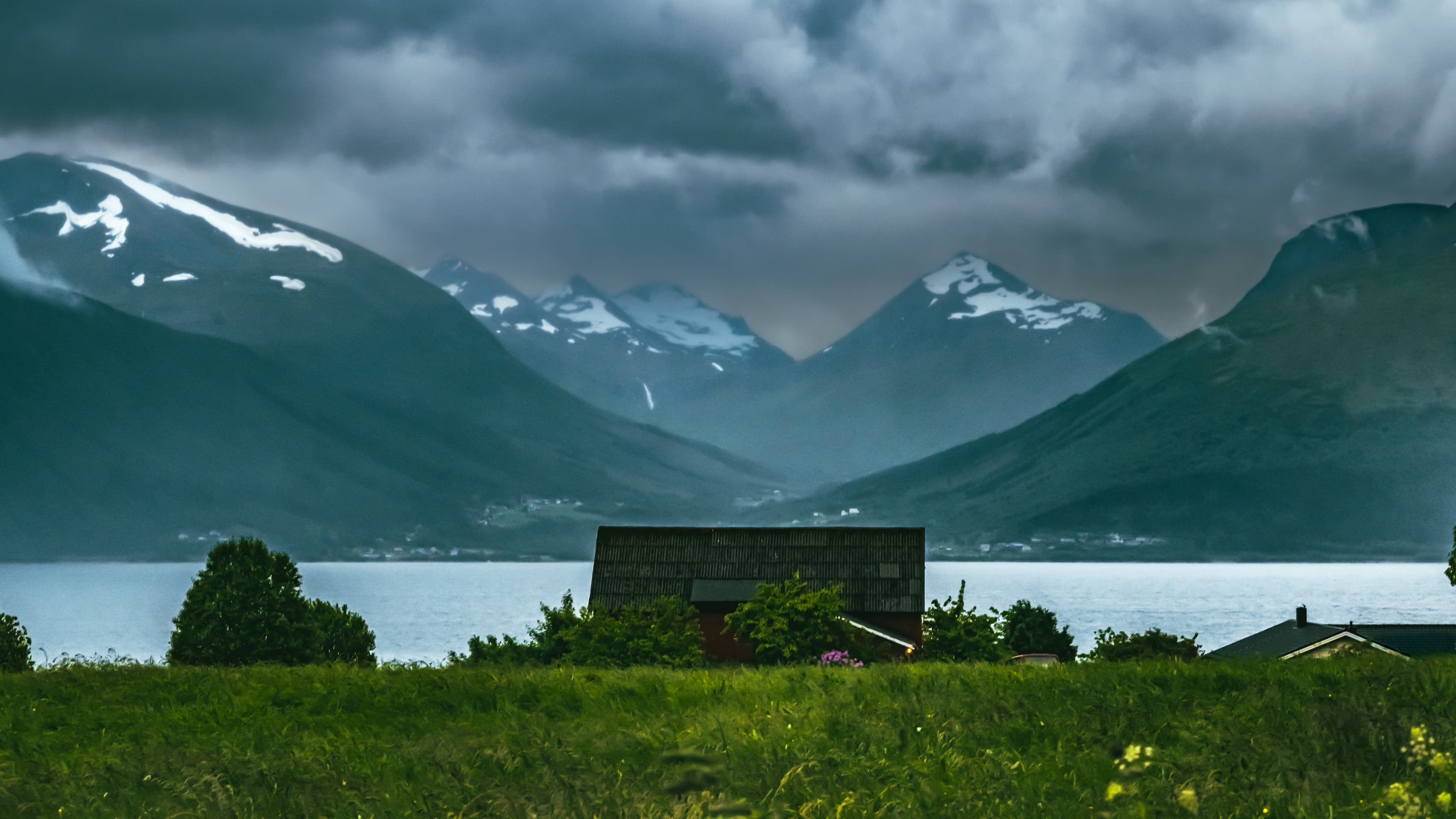 Rustic Barn Stormy Norwegian Fjord Snowcapped Mountains Sula