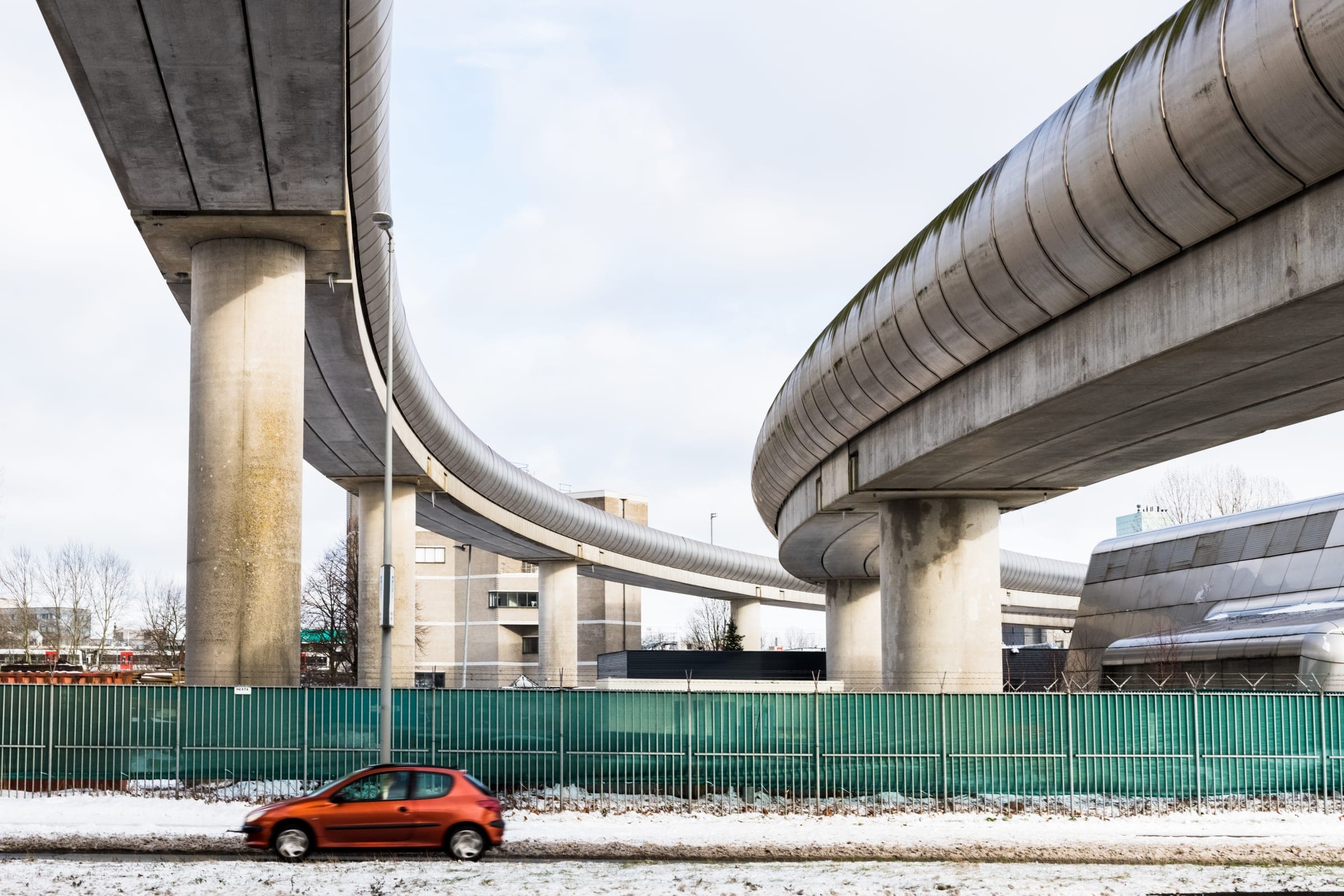 Curving flyovers above a winter road